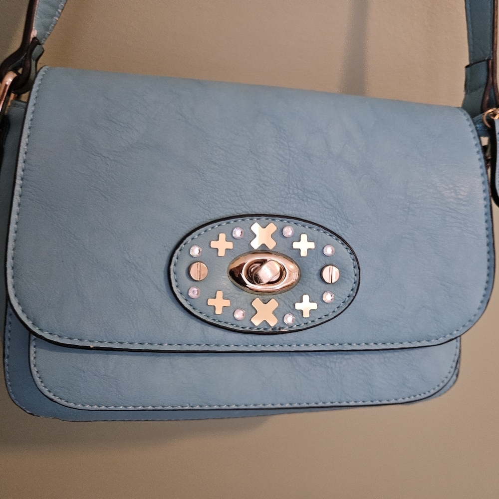 Simply Noelle Blue Crossbody Bag with Structured Shape and Decorative Hardware